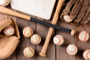 Baseball Gear on Rustic Wood Surface